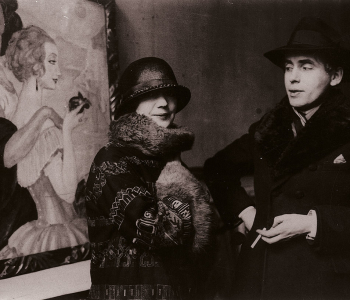 Gerda-and-Einar-Wegener-in-front-of-Gerda’s-painting-Sur-la-route-dAnacapri-during-the-exhibition-in-Ole-Haslunds-Hus1924.-Photo-The-Royal-Library-Denmark